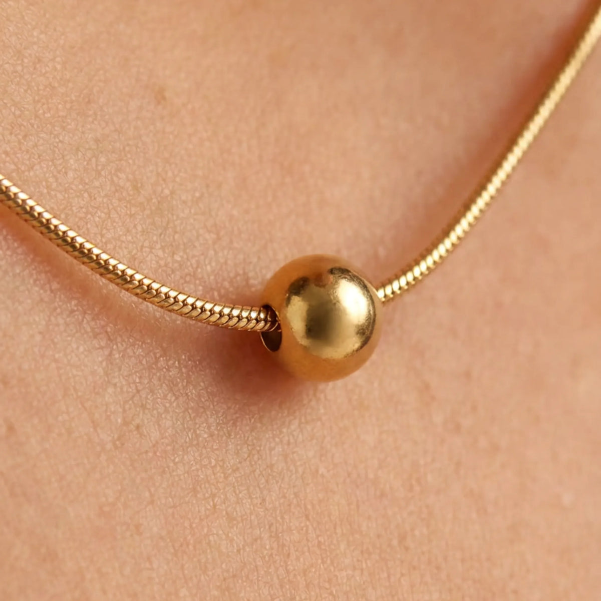 Customized Necklace by Urban Heaven in White / Gold color, shown in a macro detail setting